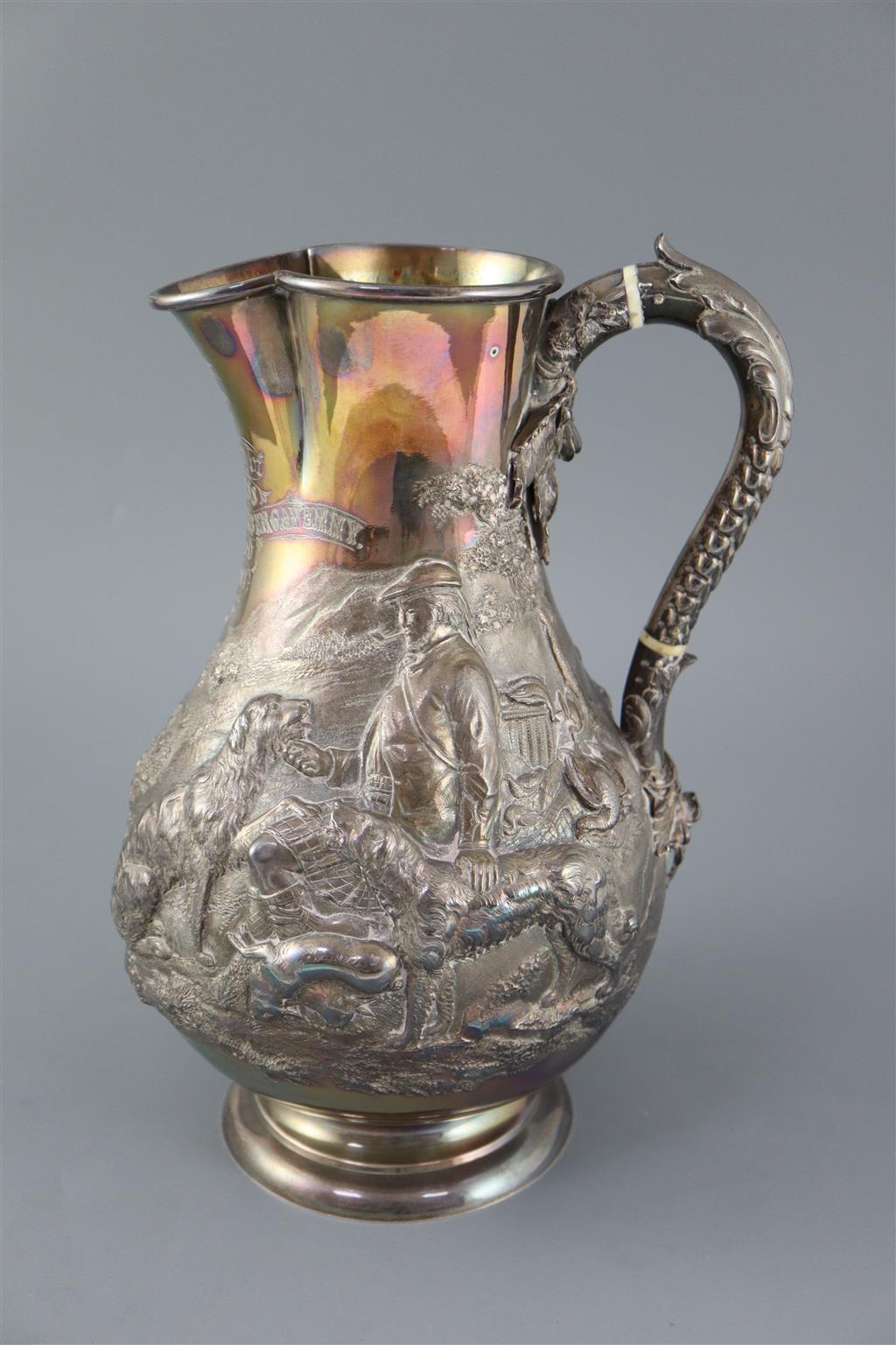 A large Victorian silver baluster hot water jug, by Robert Hennell IV,